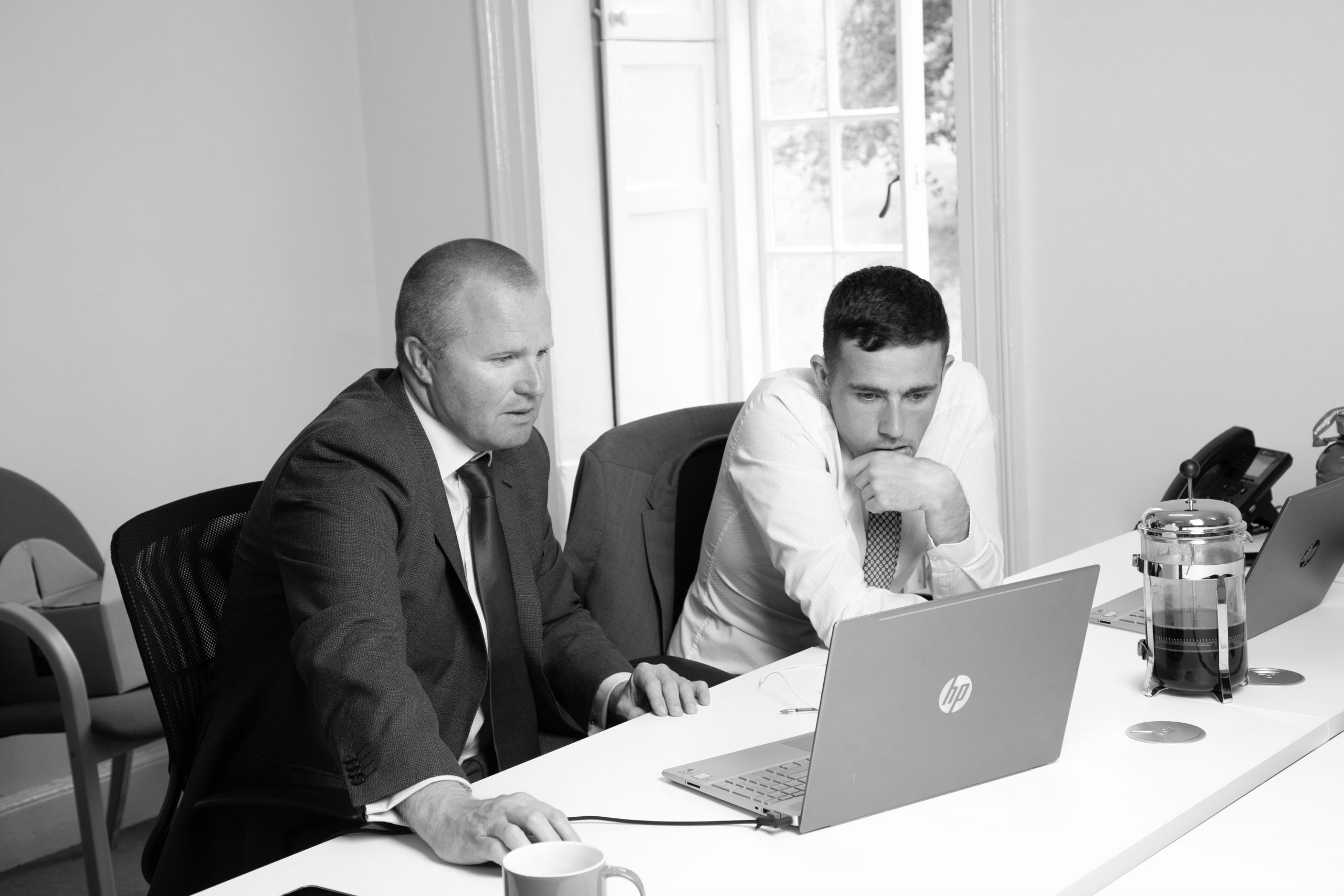 two colleagues working at computer